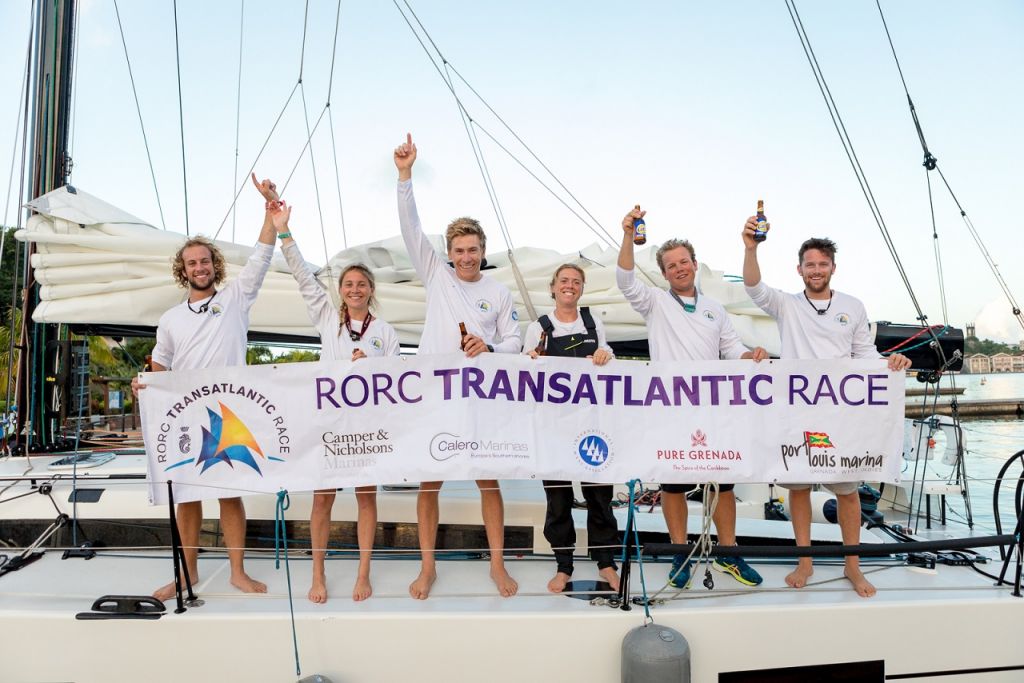 Team Pata Negra: Conor Totterdell, Cat Hunt, Will Harris, Amy Seabright, Andy Lis and Calum Healey celebrate with an ice cold beer on arrival in Grenada © RORC/Arthur Daniel
