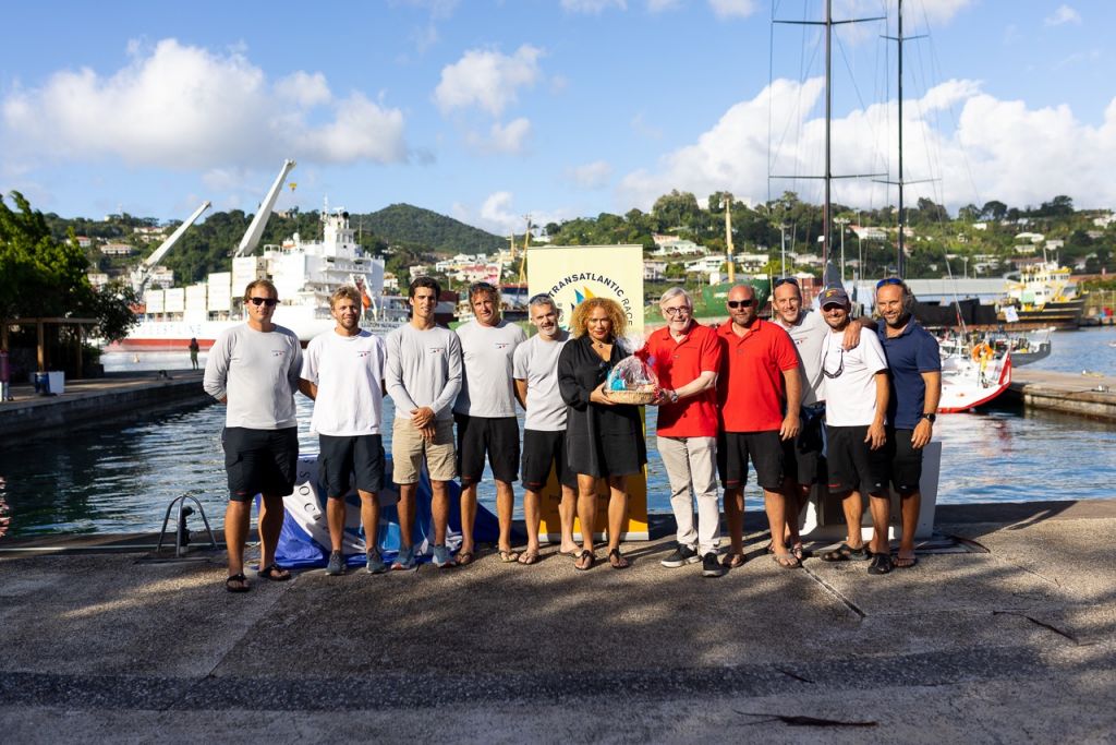 Petra Roach, CEO of Grenada Tourism Authority congratulates and presents Canada Ocean Racing with a gift basket © Arthur Daniel/RORC