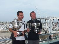 Nick Martin and Barry Hurley collecting their spoils after winning the Cherbourg Race in Nick's J 105, Diablo-J