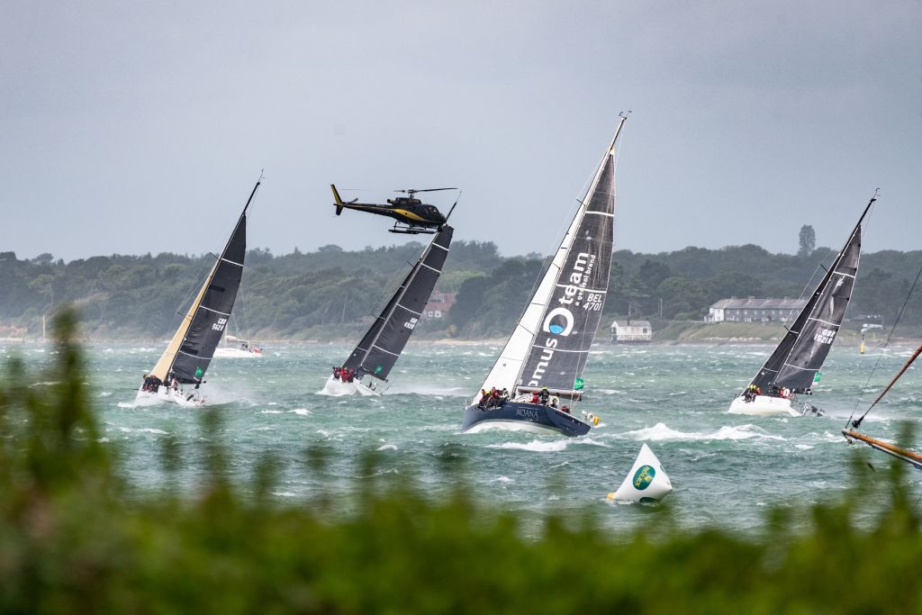 The media helicopter captures the huge fleet in the Solent at the start of the race © Paul Wyeth/pwpictures.com