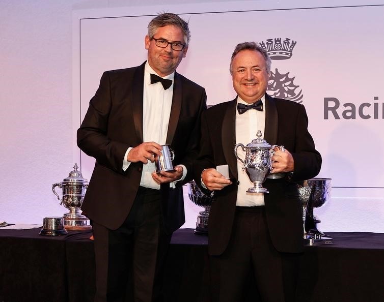 RORC Commodore James Neville (right) is presented with the Europeans Cup by RORC Racing Manager Chris Stone for winning IRC Zero in his HH42 INO XXX © Rich Bowen Photography