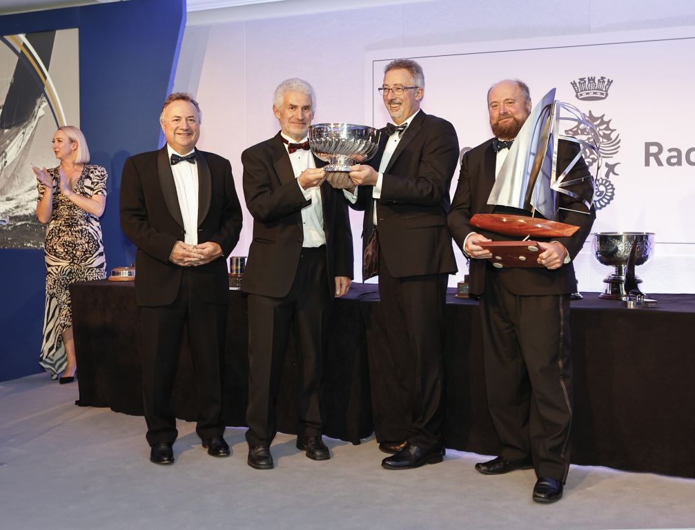 L to R: James Neville, RORC Commodore, Rupert Holmes, Richard Palmer, Jeremy Waitt. Jangada received a haul of prizes including the Jazz Trophy for IRC Overall and the Somerset Memorial Trophy for RORC Yacht of the Year © Rich Bowen Photography