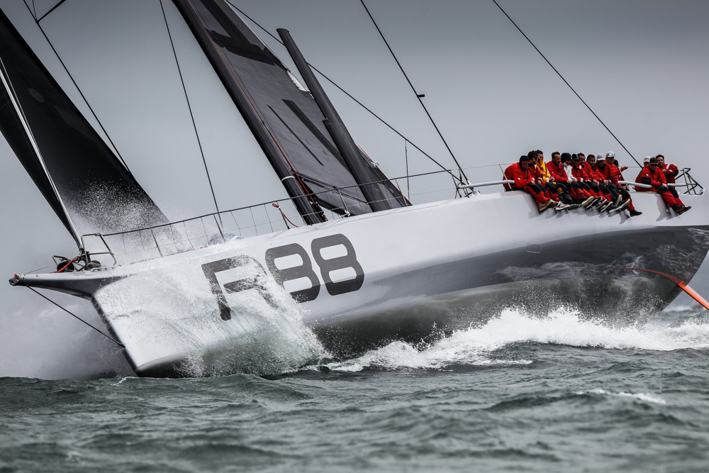 George David's Rambler 88 powers to windward, down the Solent at the start of the Royal Ocean Racing Club's Myth of Malham Race. Photo: RORC/Paul Wyeth