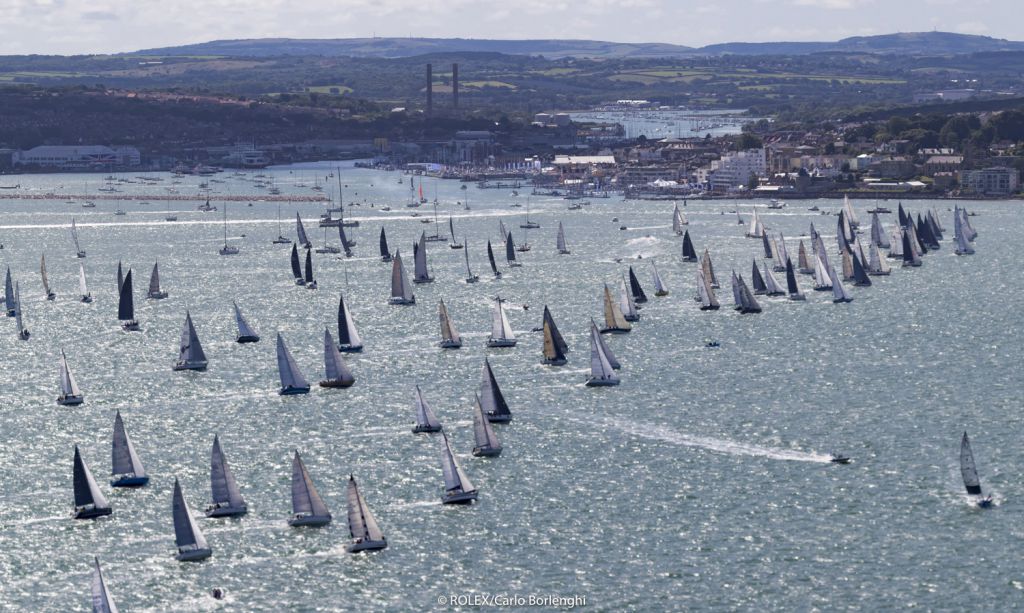 The 47th Rolex Fastnet Race gets underway from the Royal Yacht Squadron line, Cowes, Isle of Wight UK © Rolex/Carlo Borlenghi