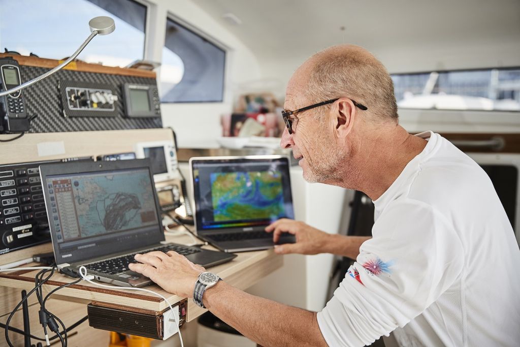 Gerald Bibot analysing the weather scenario for the 2017 RORC Transatlantic Race. He is competing for the second time in his catamaran Zed 6 © RORC/James Mitchell 