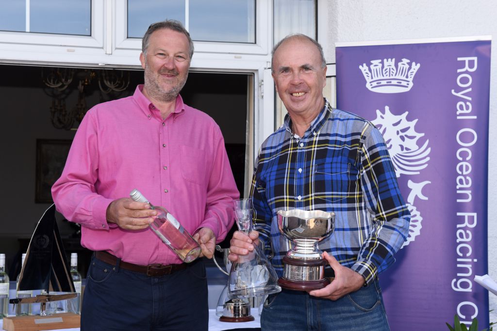 Robert Stiles triumphs with Diamond Jem in the J/109 fleet, collecting trophies presented by Stephen Anderson, Vice-Commodore of RORC - copyright Rick Tomlinson 