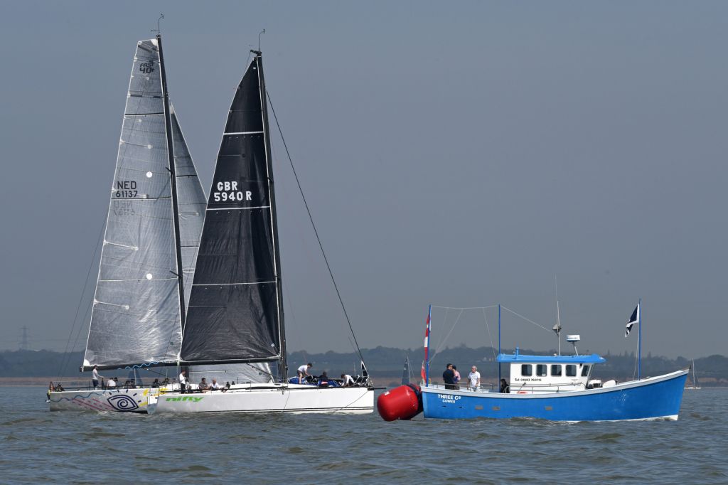 AP flag hangs limply on the Committee boat on day 1 of the RORC Easter Challenge. Picture: Rick Tomlinson