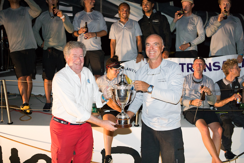 Andrew McIrvine, Secretary General of the IMA, presents the IMA Trophy to Childhood 1 skipper Bouwe Bekking - Photo © RORC / Arthur Daniel