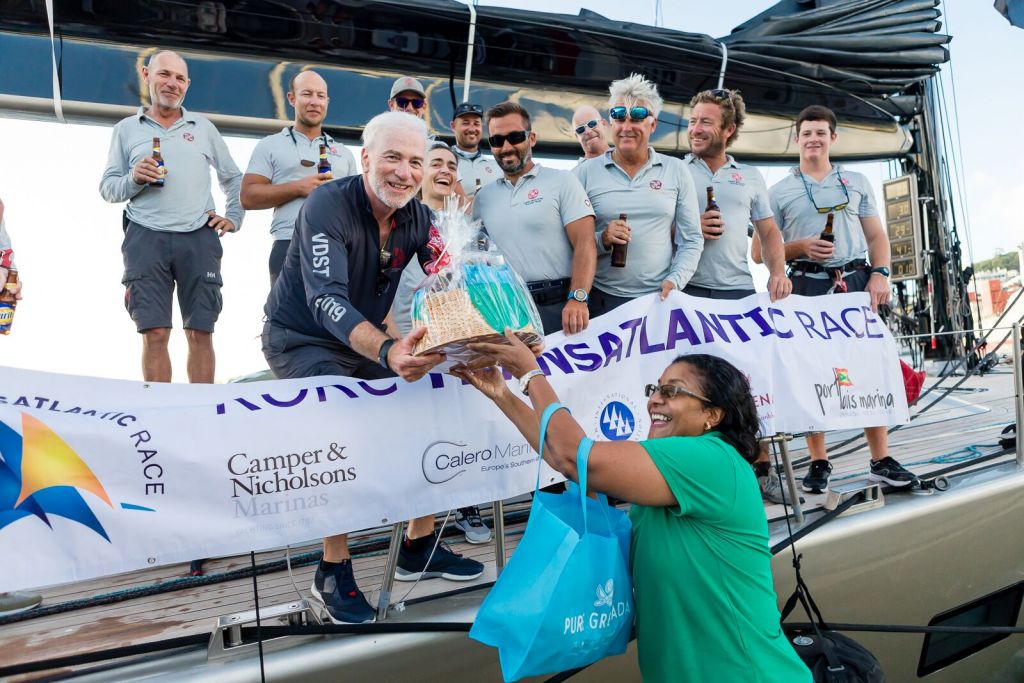 A fantastic welcome on the dock for Dark Shadow team at Camper & Nicholsons Port Louis Marina, Grenada © Arthur Daniel/RORC