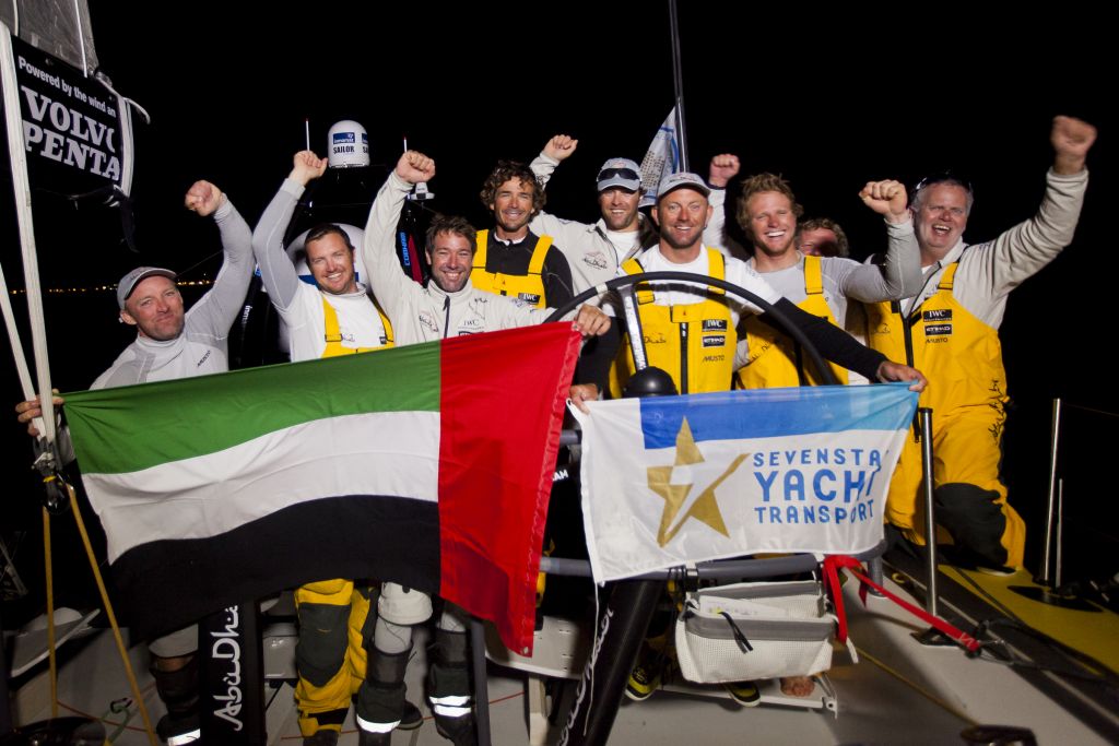 roman 140815 1261 the team celebrate finishing the race in a new record time of 4 days 13 hours 10 minutes and 28 seconds