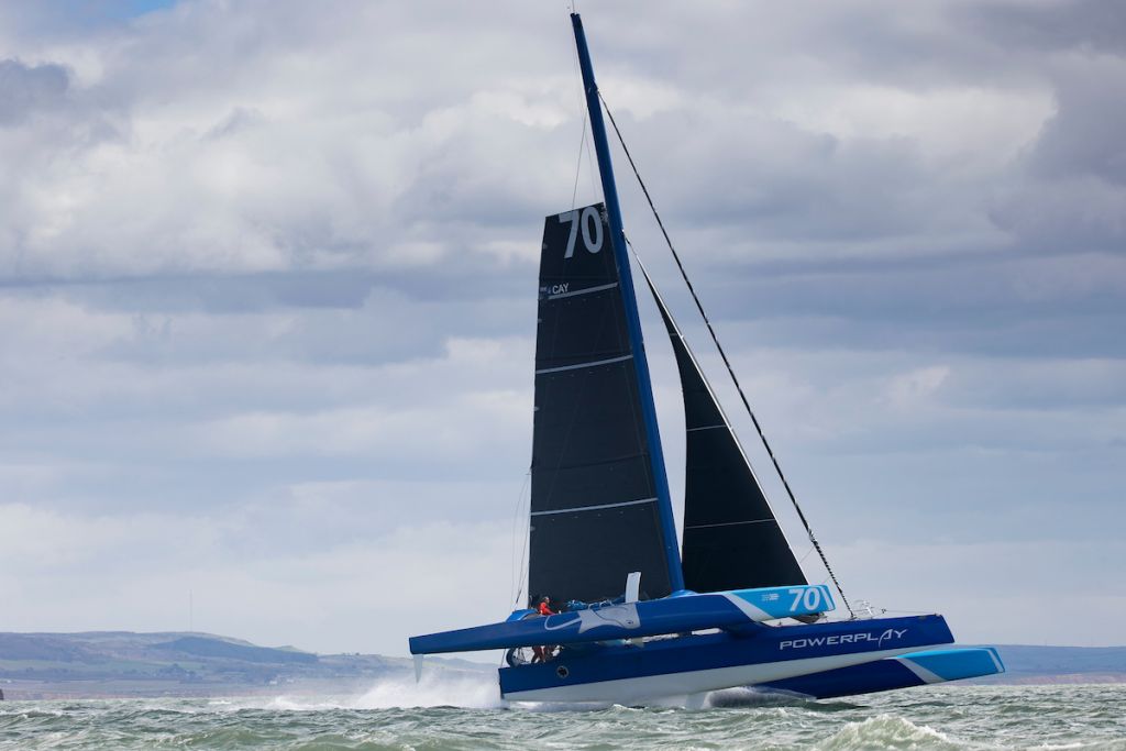 MOD 70 PowerPlay led by Peter Cunningham smashes the world record for the Fastnet Course © Lloyd Images