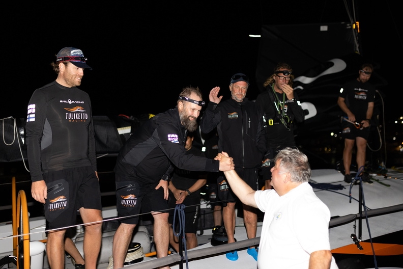 A warm welcome on the dock at Camper & Nicholsons Port Louis Marina, Grenada for the team on Infiniti 52 Tulikettu (FIN) © Arthur Daniel/RORC